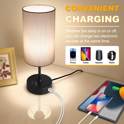 Unicozin table lamp complements modern decor with a grey shade.