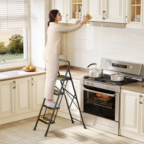 Urackify 4 step ladder showing ergonomic safety latch for secure folding.