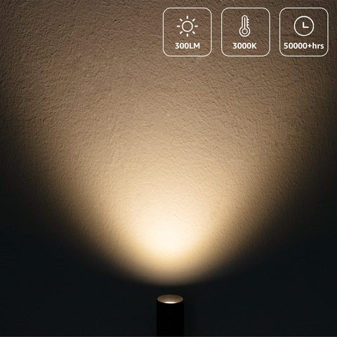 URTOM sturdy metal-base uplight for floor or table use.