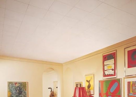 USG Interiors smooth white tile provides a clean, textured-free look.