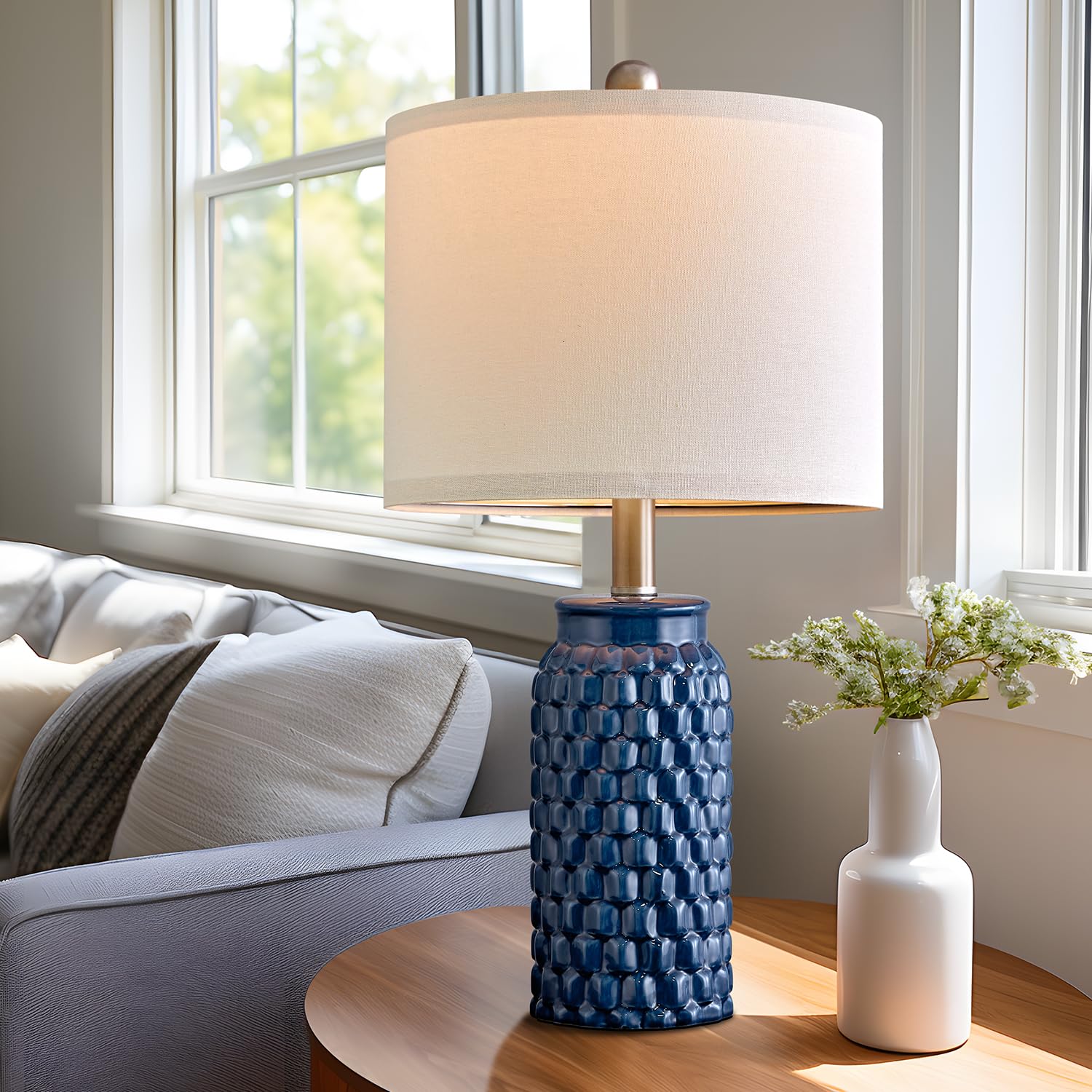 USumkky ceramic-base lamp with compact footprint fits small nightstands.
