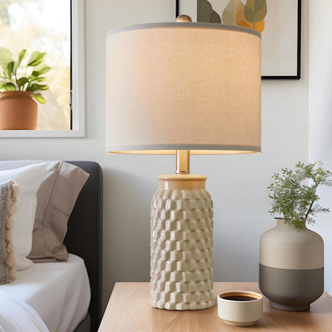 USumkky ceramic base with cream shade provides sturdy support on desks and tables.