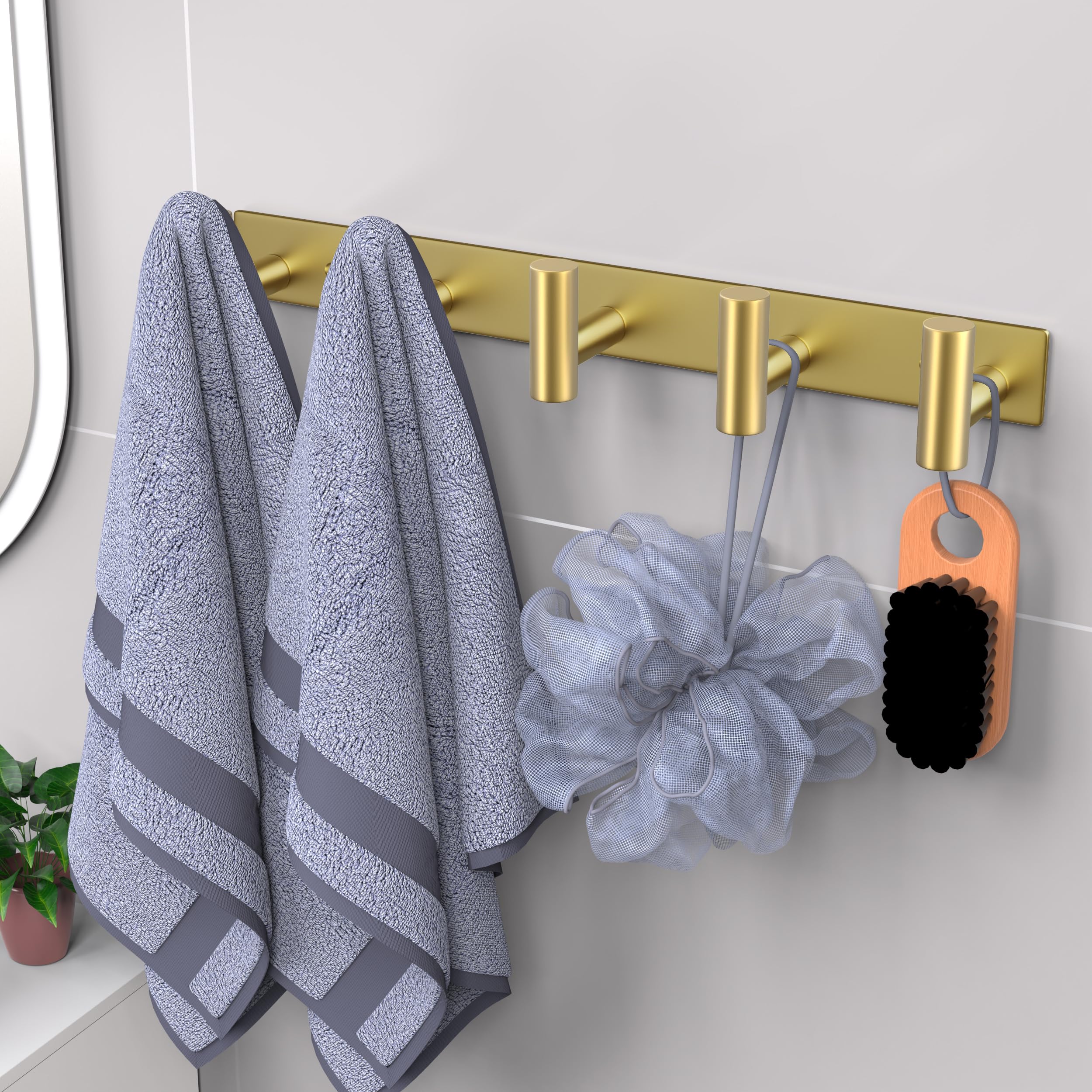 VAEHOLD close-up of the gold rack showing anti-slip hooks for secure hanging.