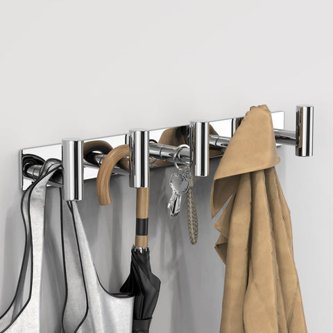 VAEHOLD wall mount close-up showing anti-slip hooks for secure hanging