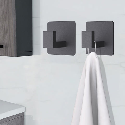 VAEHOLD hook on smooth surface proves adhesion on tiles, glass, metal.