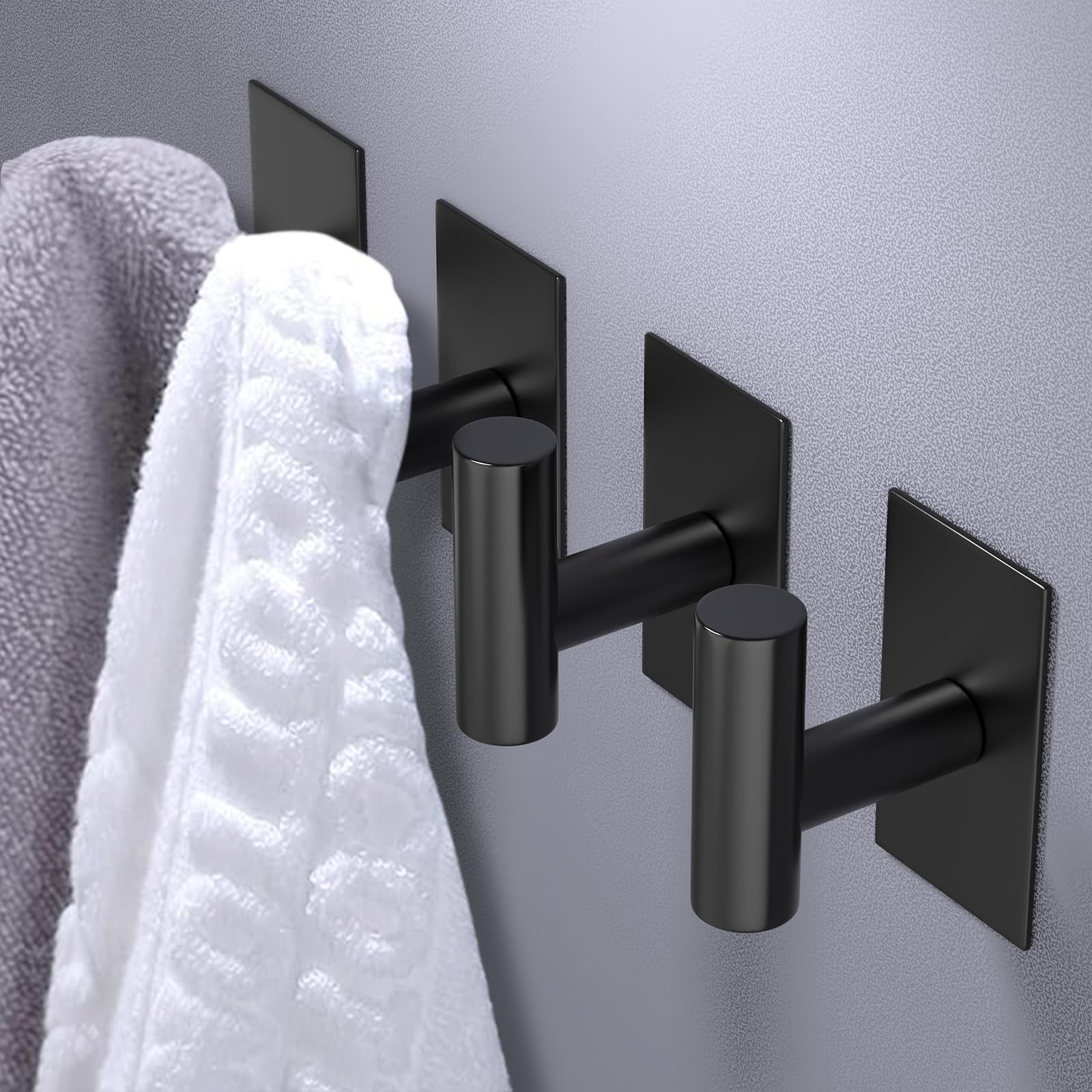 VAEHOLD wall hook on ceramic tile demonstrating easy, damage-free mounting.