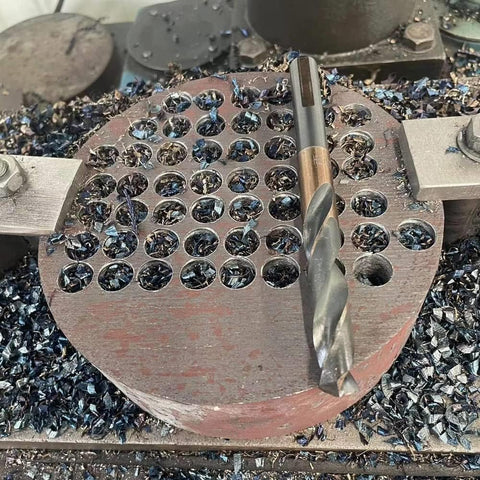 VALYRIANTOOL drill bit used on stainless steel for metalworking.