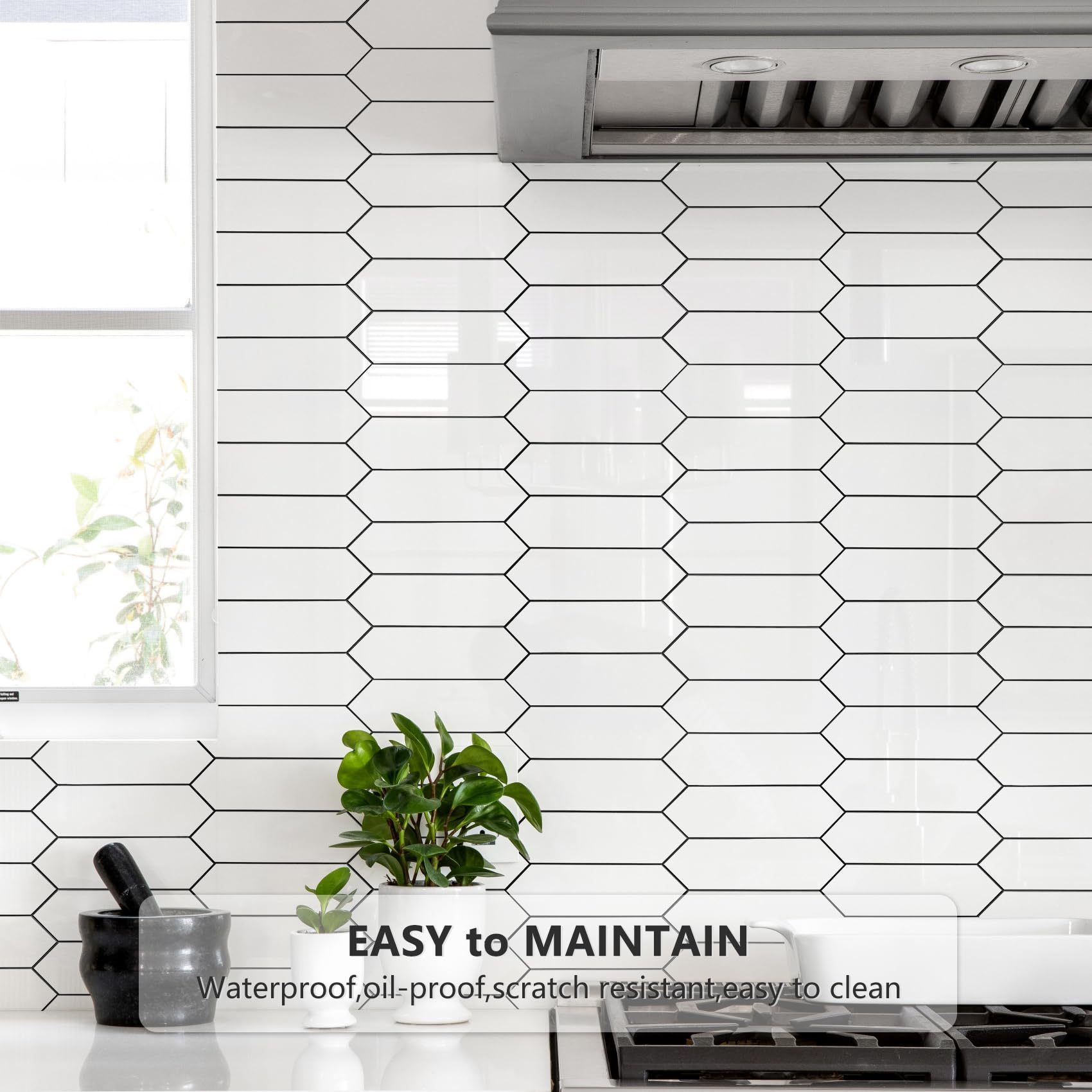 Vamos Tile glossy white hexagon backsplash tile ideal behind stoves for easy upkeep.
