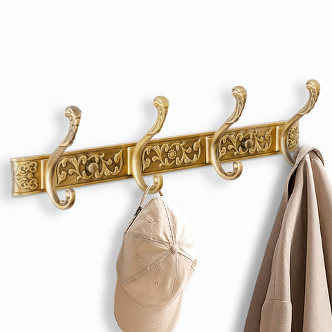 Van Cadene wall-mounted coat rack with dual-row hooks for organized hanging.