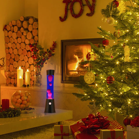 Vanful magma lamp white wax under purple glow creates soothing color shifts for ambience.