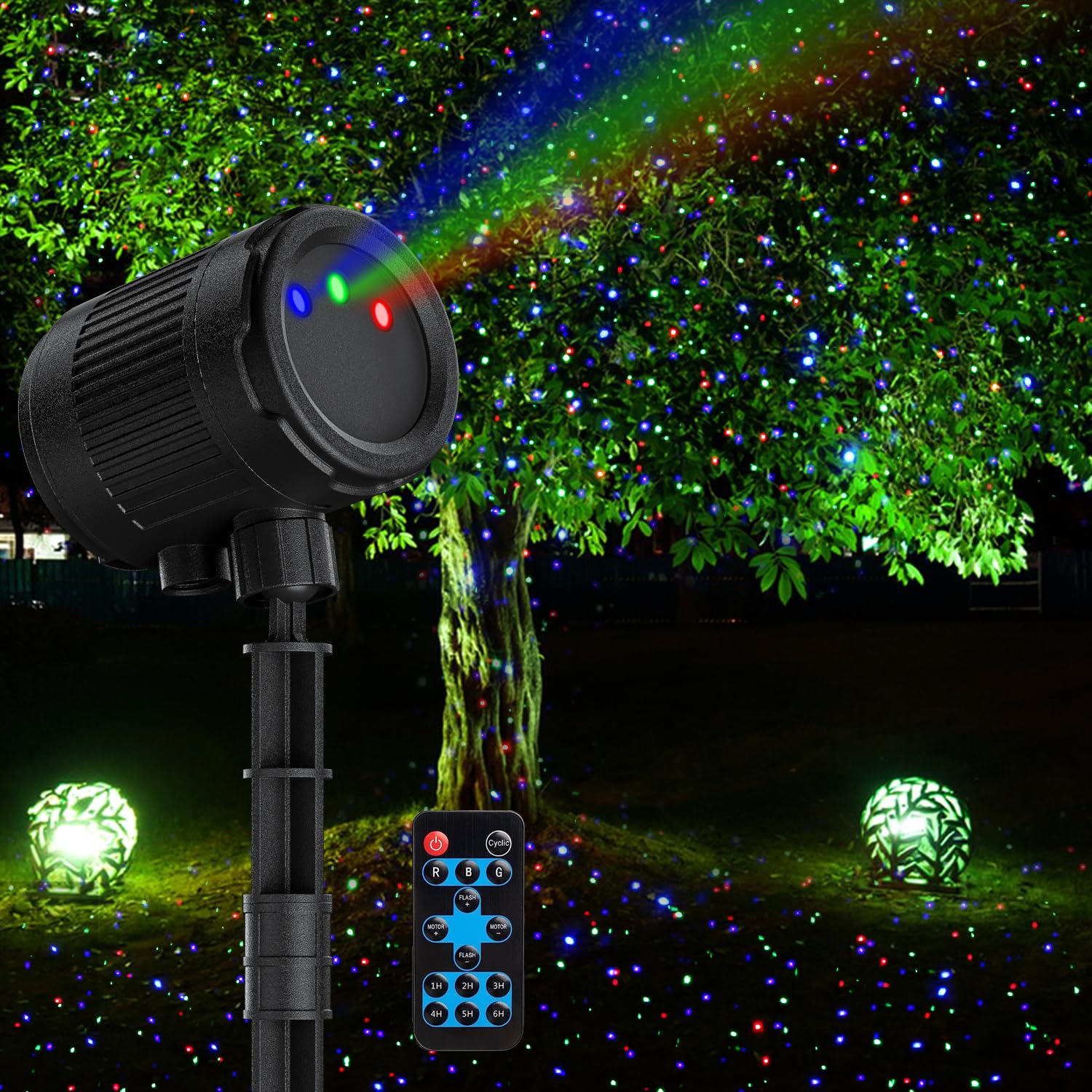 VanSmaGo laser christmas projector outdoors casting RGB fireflies on the home façade.