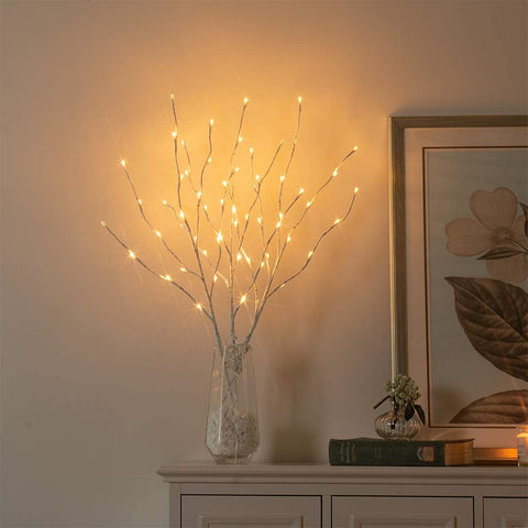 Vanthylit birch branch indoor window display with inviting glow