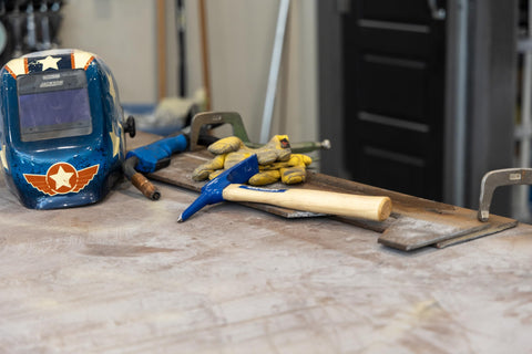 Close-up of Vaughan WC12 handle showing Sure-Lock hickory grip for secure use.