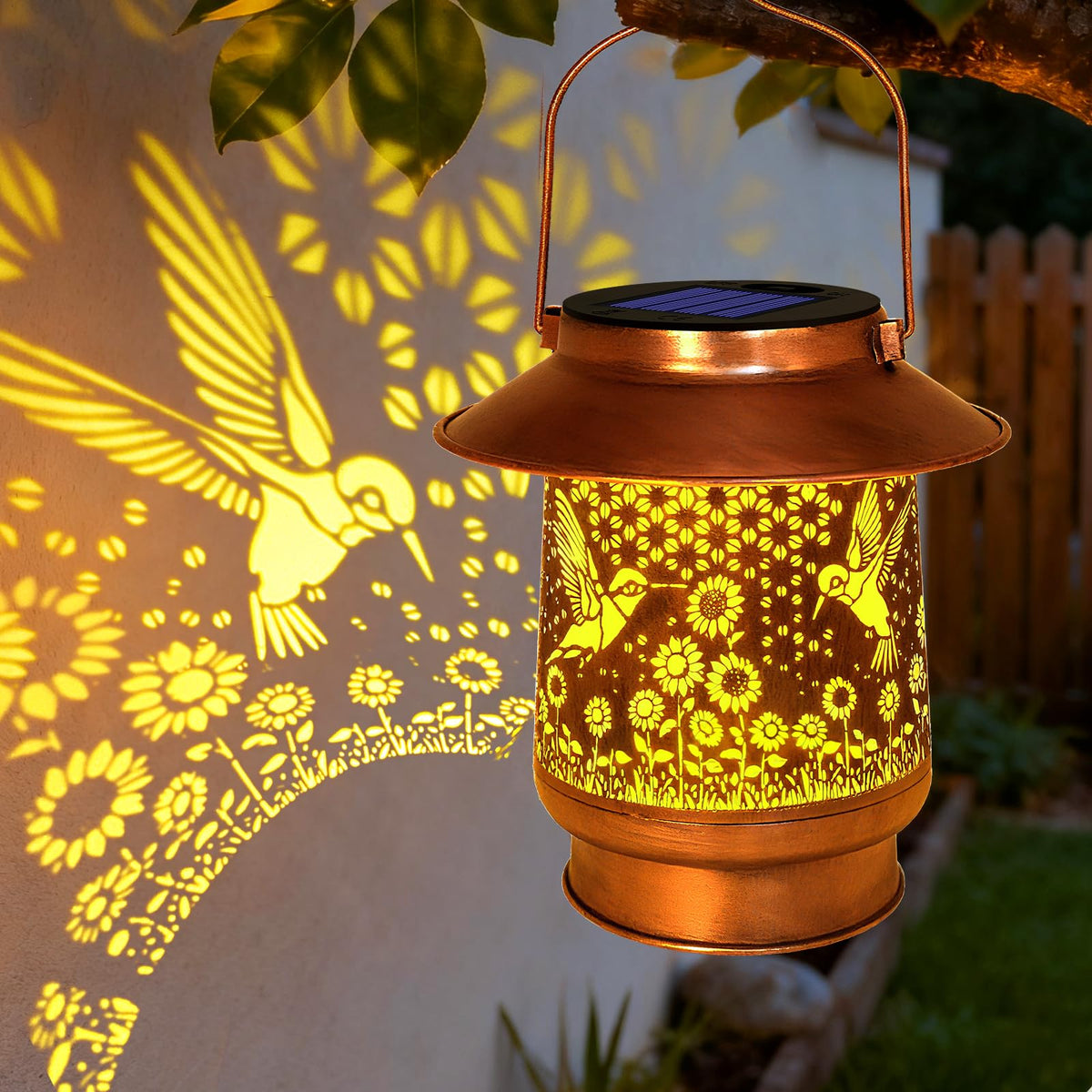 Vcdsoy hummingbird solar lantern on patio glows warmly for evenings.