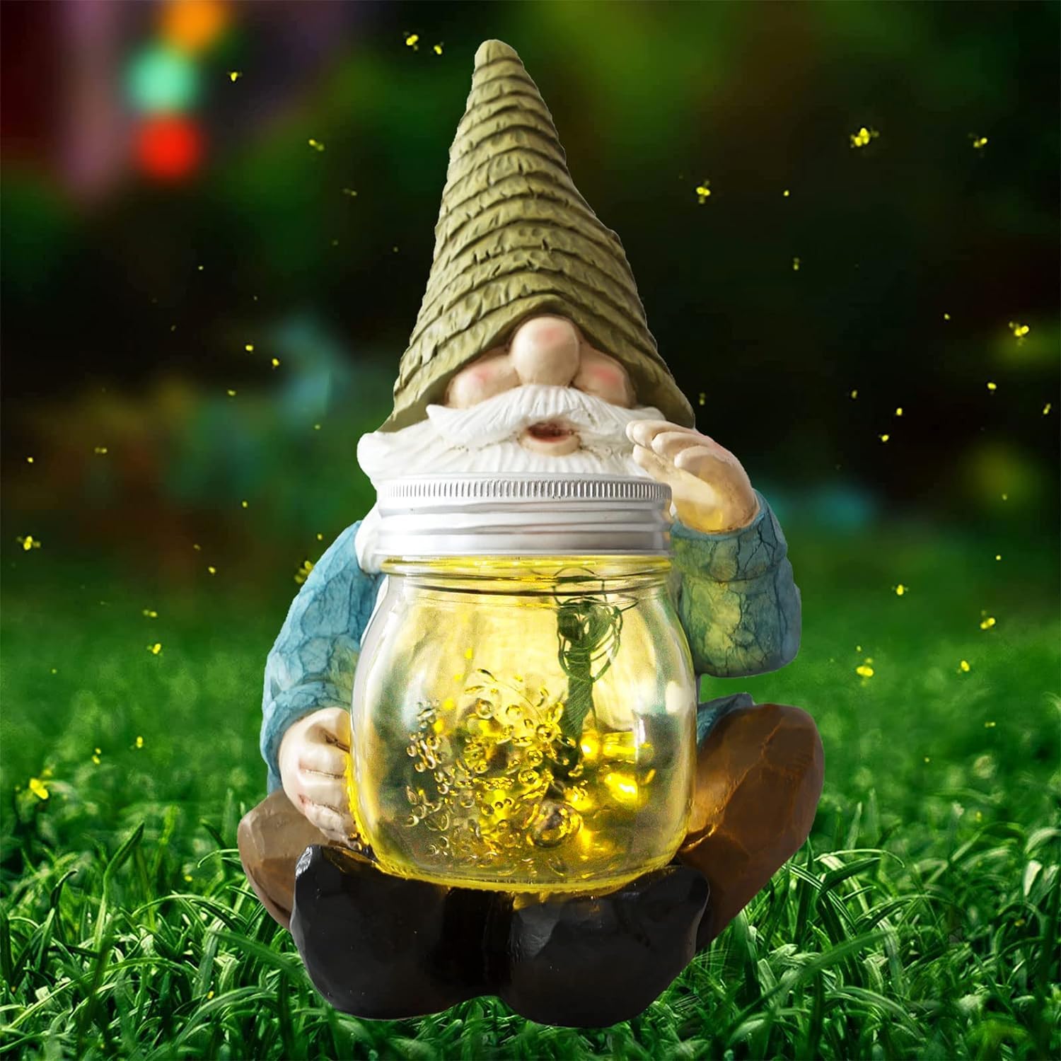 Vcdsoy Solar Firefly Jar Gnome glowing at night with firefly LED bulbs, perfect for garden magic.