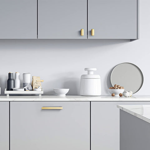 VEHCIL drawer and cabinet hardware in gold adds warm luxury.