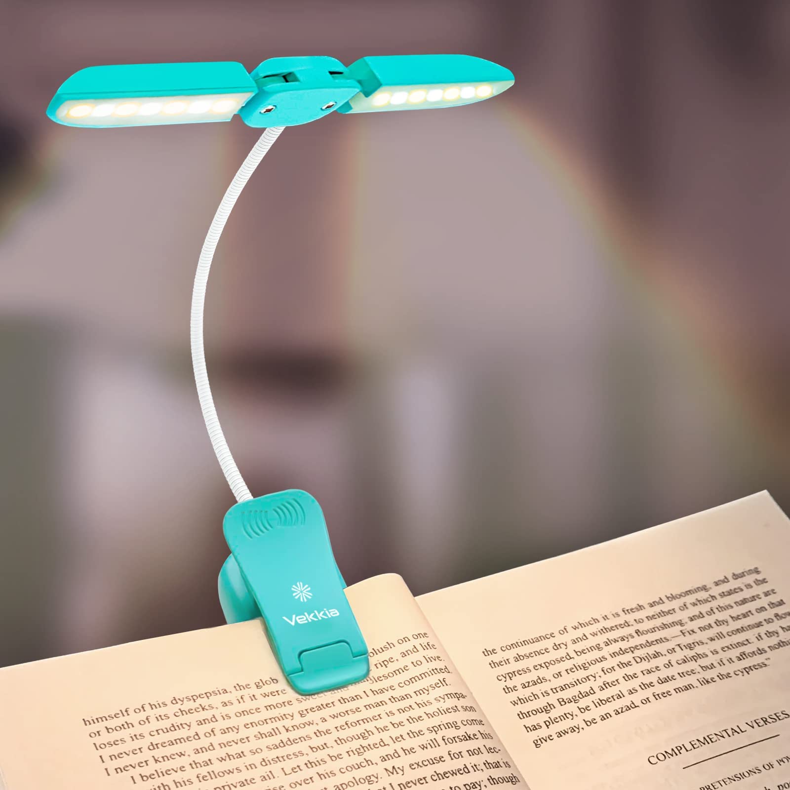 Vekkia 14 LED book light clipped on a book for focused nighttime reading