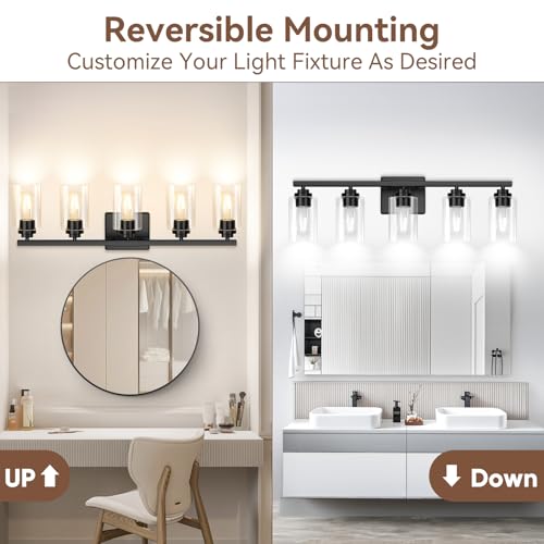 VerRon over mirror fixture with clear glass shades and bold contemporary finish.