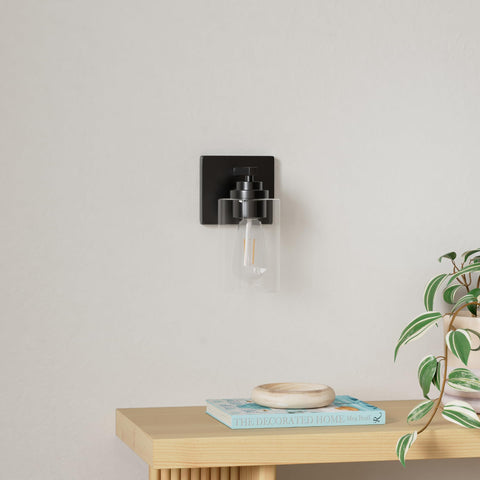 VerRon wall sconce with matte black finish for modern bathroom vanity.
