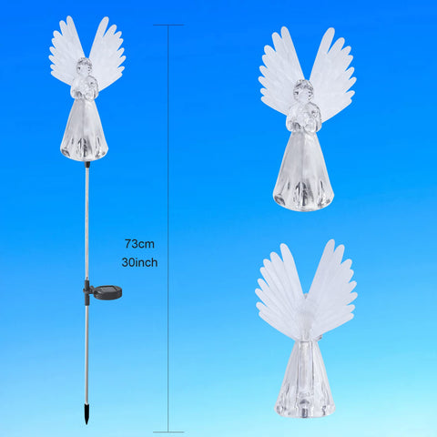 VGE Solar Angel Light glowing along a grave or garden path.
