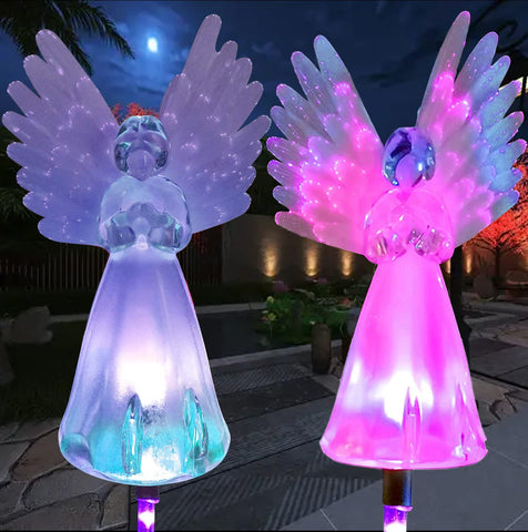 VGE Solar Angel Light stake in the garden showcasing its elegant angel design for serene evenings.