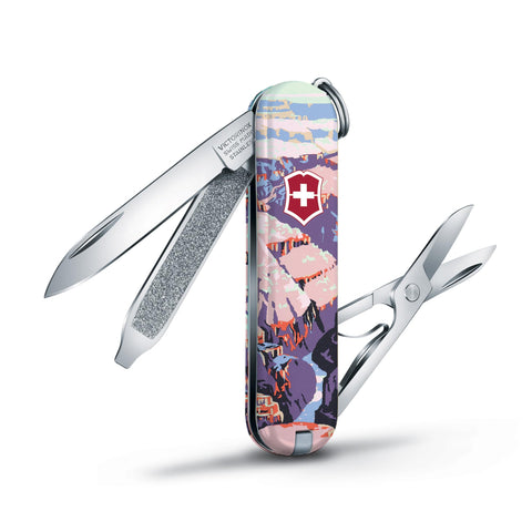 Victorinox Classic SD handle featuring Ranger Doug poster detail for outdoor style.