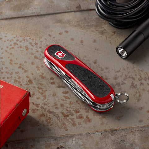 Victorinox Evolution 14 Grip can opener and corkscrew in action for prep.