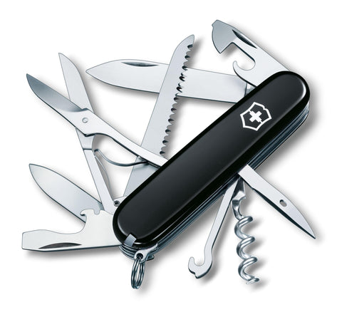Victorinox Huntsman wood saw for outdoor projects and campsite preparation