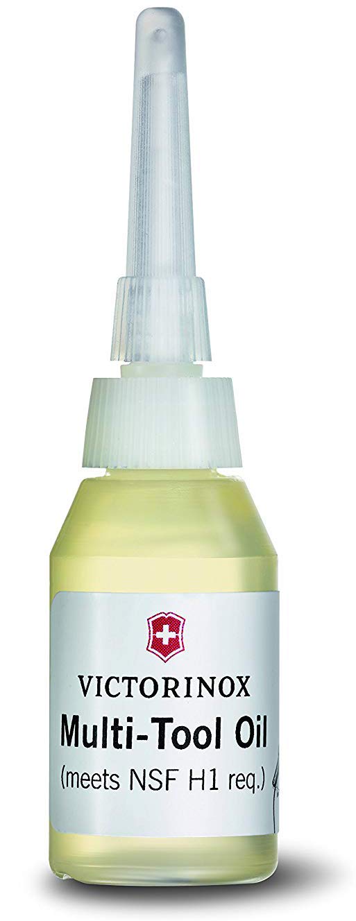 Victorinox multitool oil bottle pour showing precise lubrication for smooth action.
