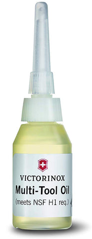 Victorinox multitool oil bottle pour showing precise lubrication for smooth action.