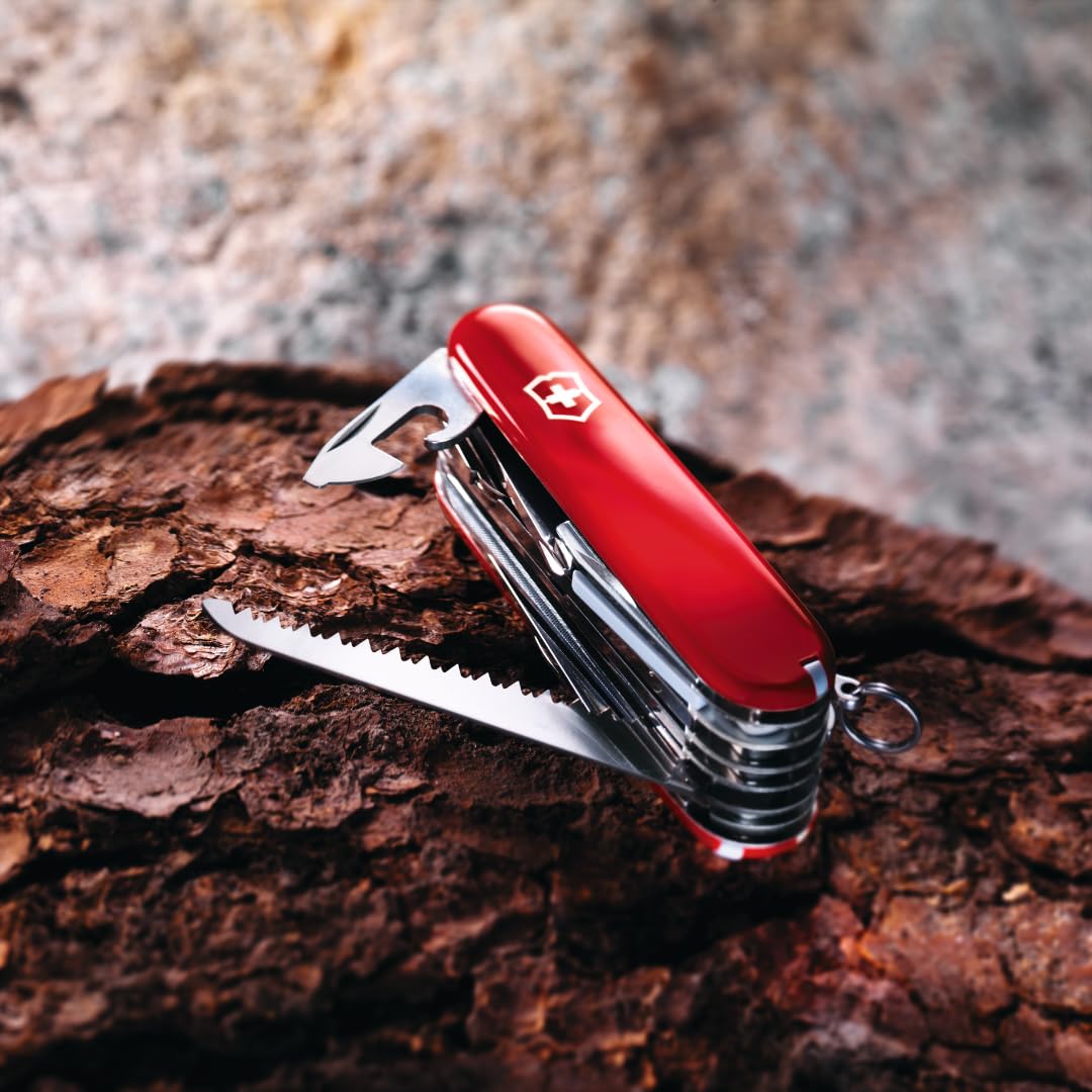 Victorinox Rambler bottle opener with magnetic Phillips screwdriver in use