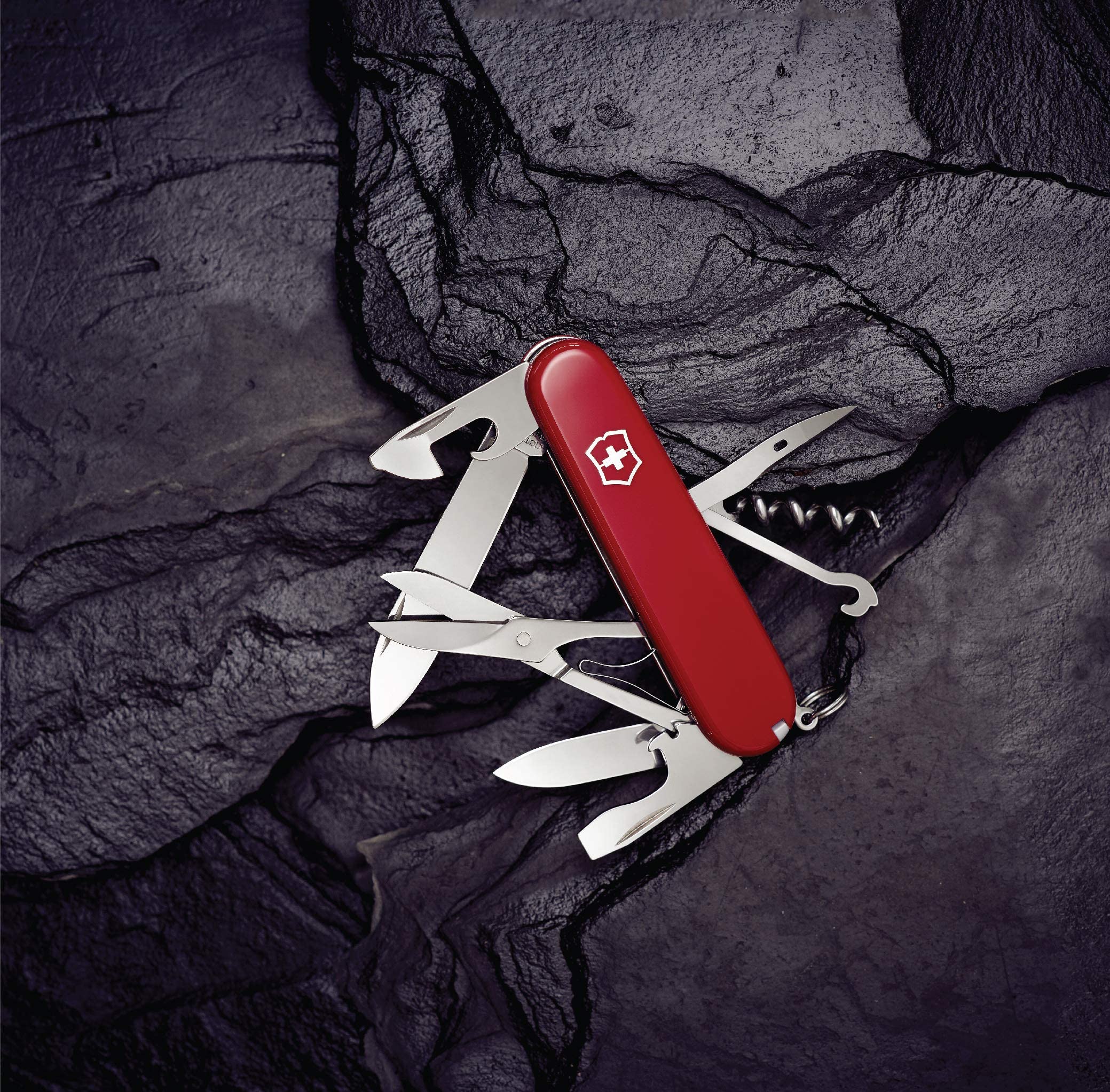 Victorinox Swiss Army Climber in red tucked in backpack pocket.