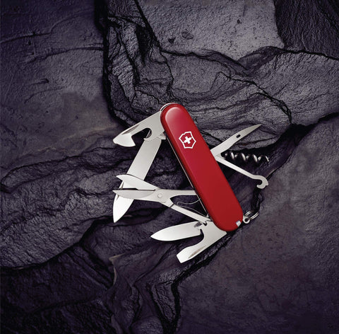 Victorinox Swiss Army Climber in red tucked in backpack pocket.