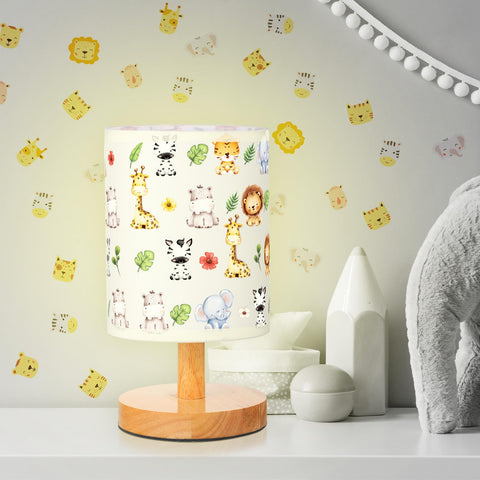 VIHOSE Safari Animal kids table lamp on bedside helps create a cozy bedtime atmosphere.