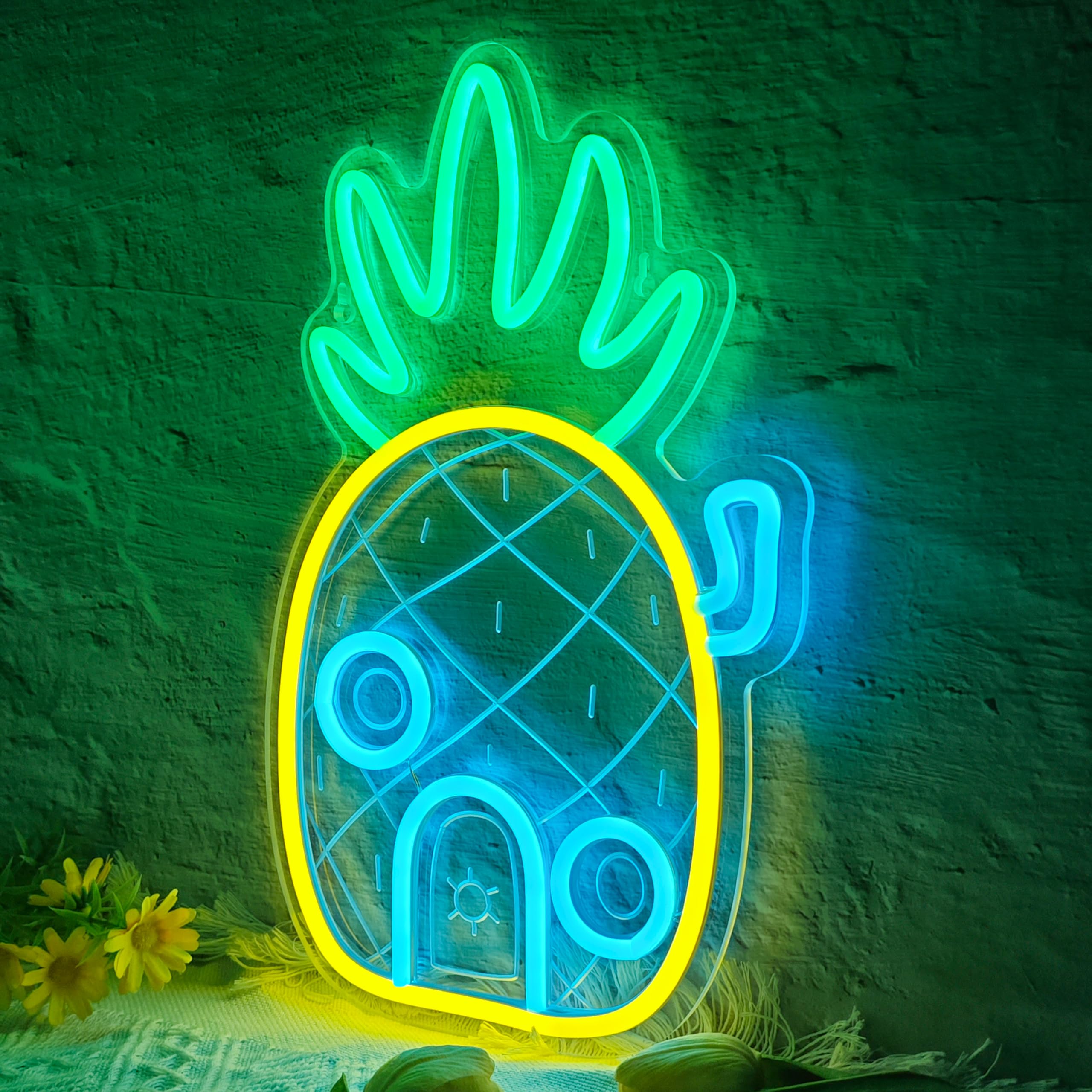 Close-up of VIKLIU Pineapple House neon sign showing adjustable brightness.
