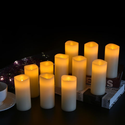 Vinkor 4-inch ivory LED pillar candle with gentle flame flicker.