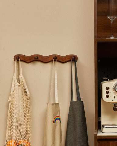 Vinoil four-hook wall rack provides space-saving organization