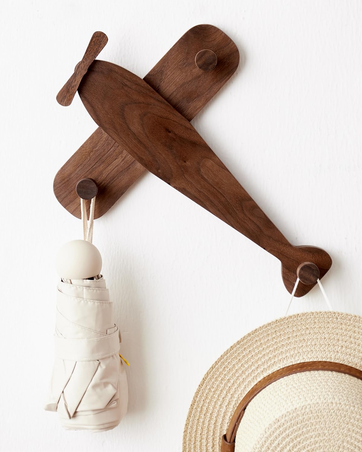 Vinoil airplane coat hook mounted on wall, ideal for kid's room organization