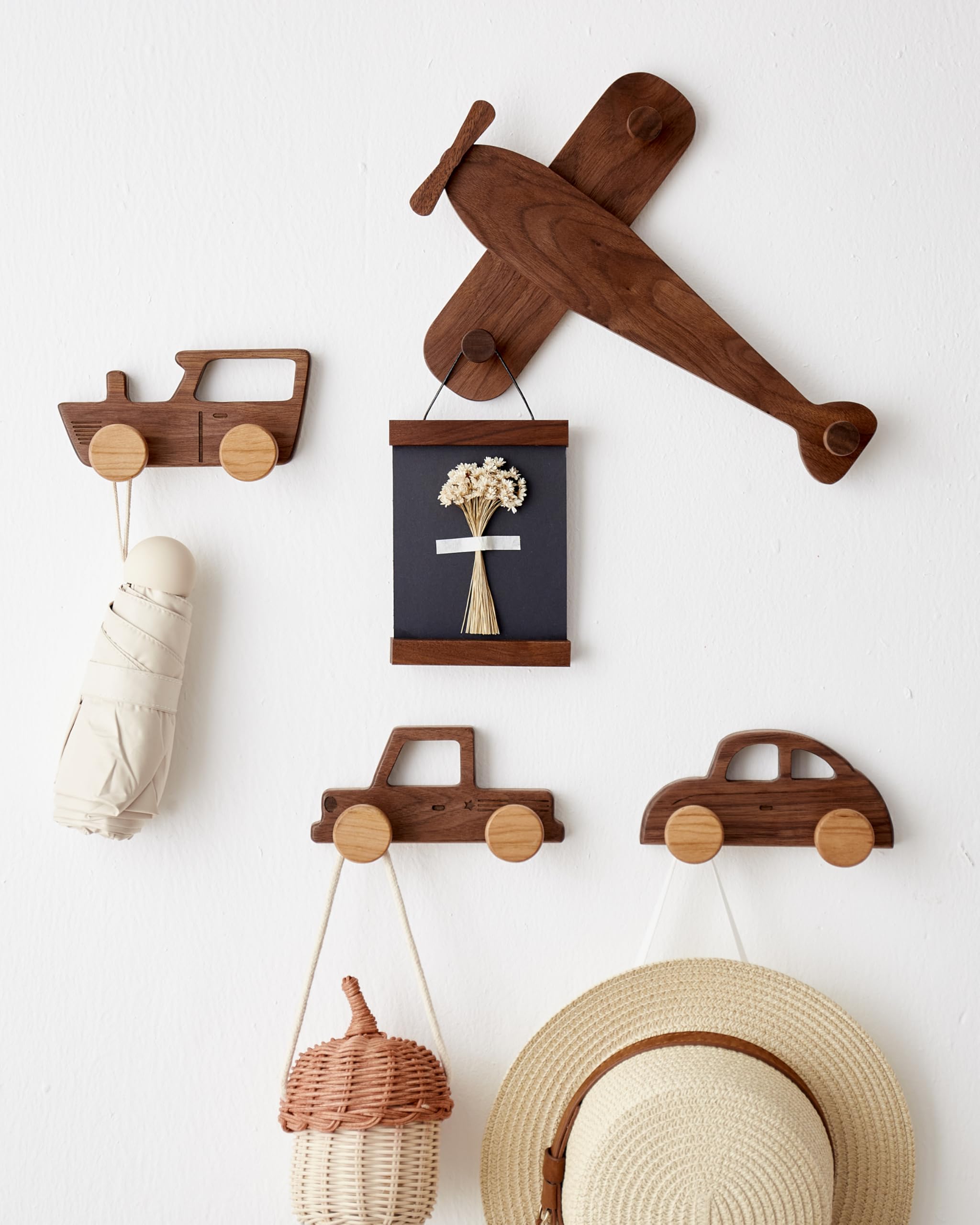 Vinoil walnut finish hook blends with modern nursery decor