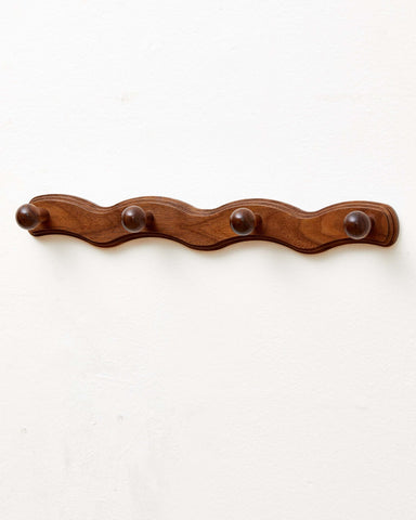 Vinoil wall-mounted walnut coat rack adds elegant entryway storage