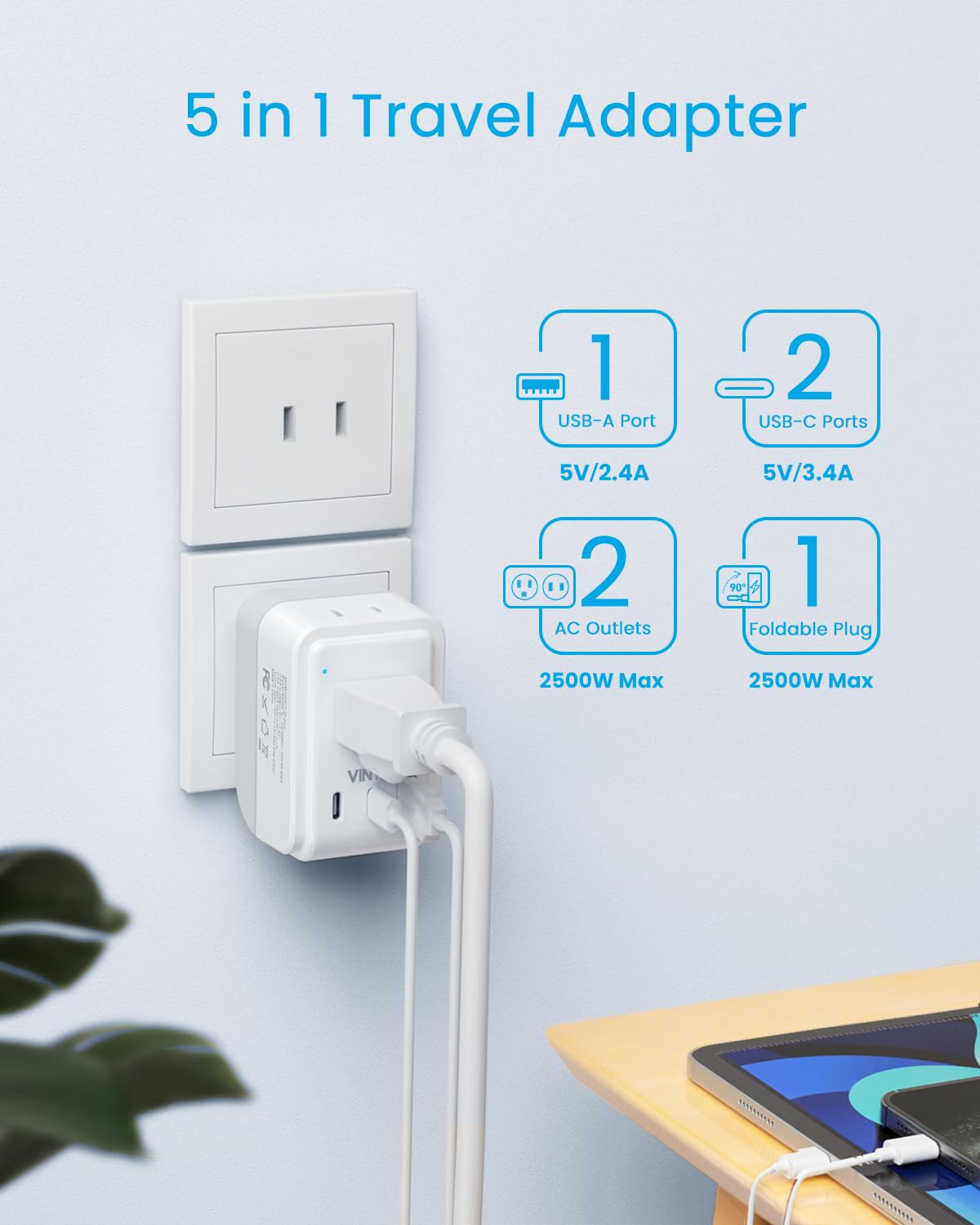 VINTAR adapter with 90-degree foldable prongs fitted into a wall outlet