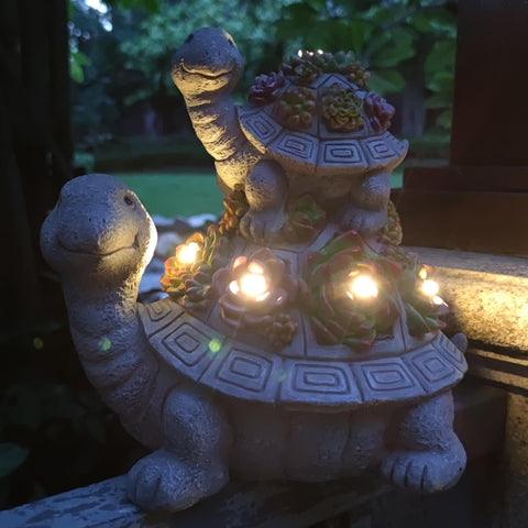 VIOYOUNS turtle solar statue side view highlights compact footprint for patios.