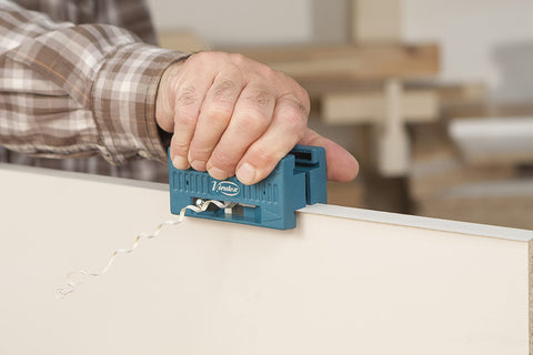 Virutex AU-93 side view demonstrates compact manual design for easy handling.