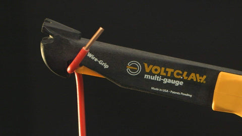 VoltClaw Multi-Gauge pliers in use at breaker panel for 6–14 gauge wires.