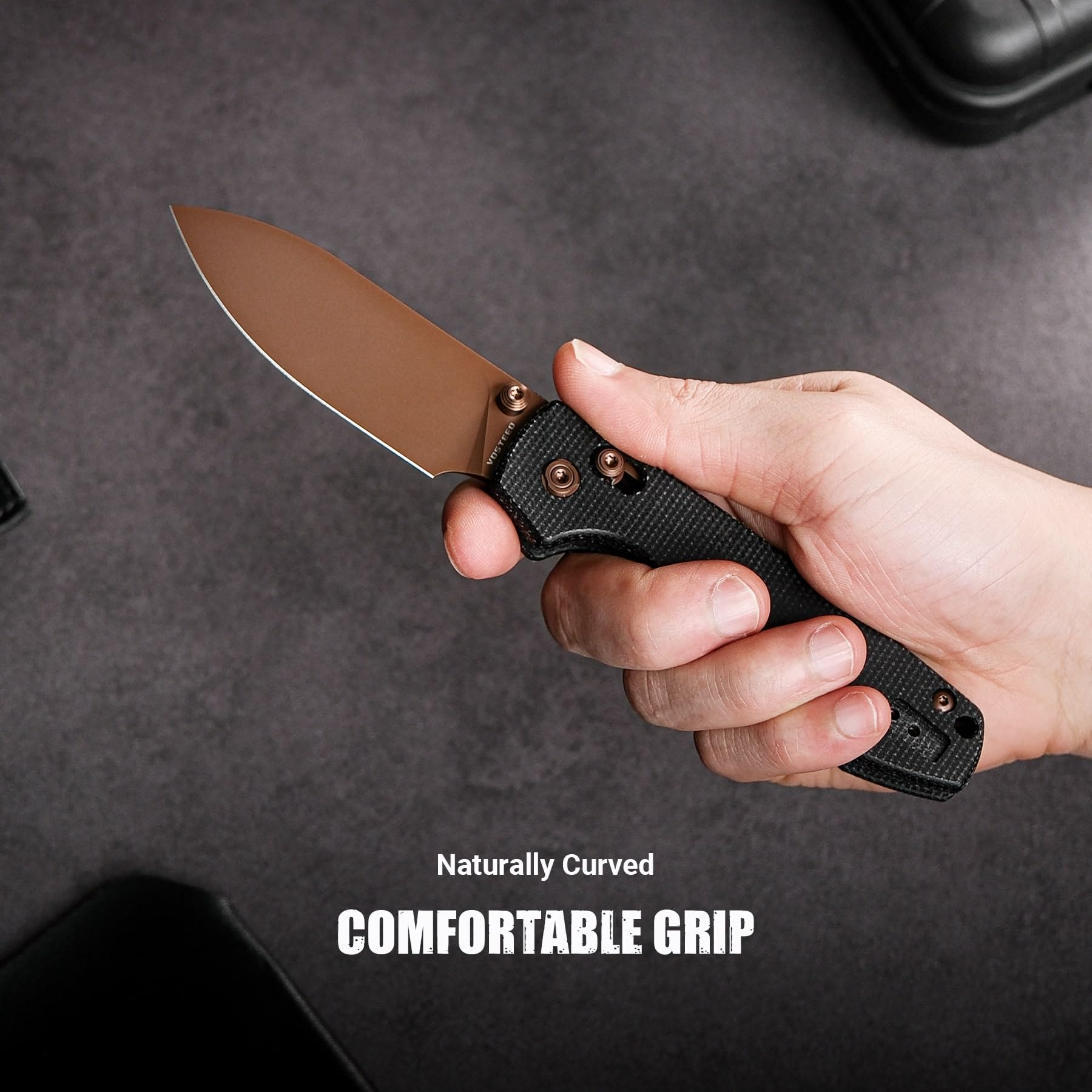 Vosteed Raccoon Micarta handle offers a secure grip.