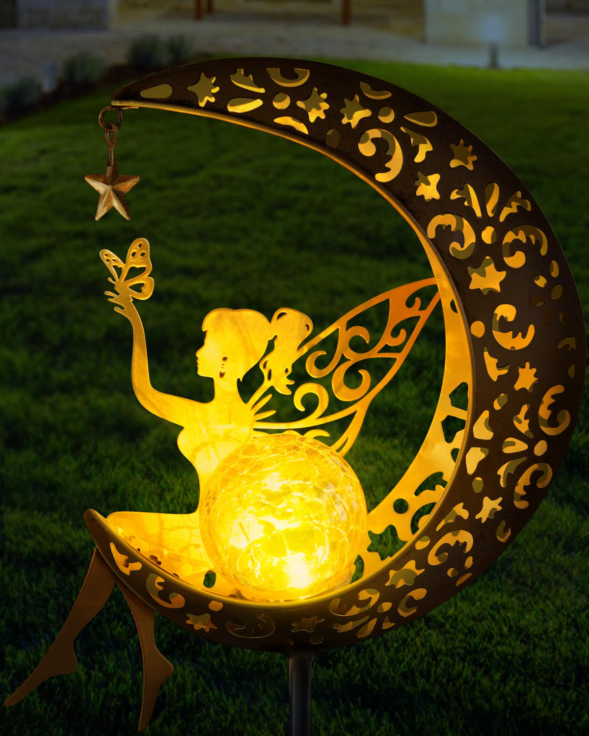 Vuees solar garden statue fairy light stake illuminating garden paths.