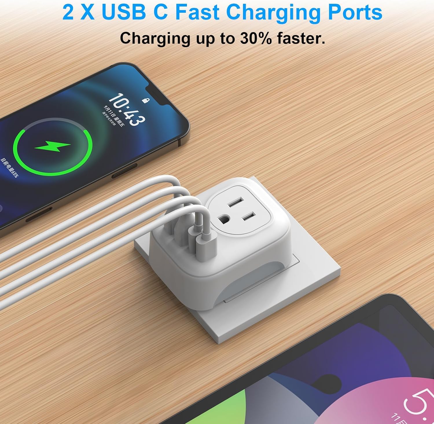 VYLEE travel adapter features four USB ports for versatile charging