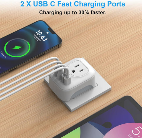 VYLEE travel adapter features four USB ports for versatile charging