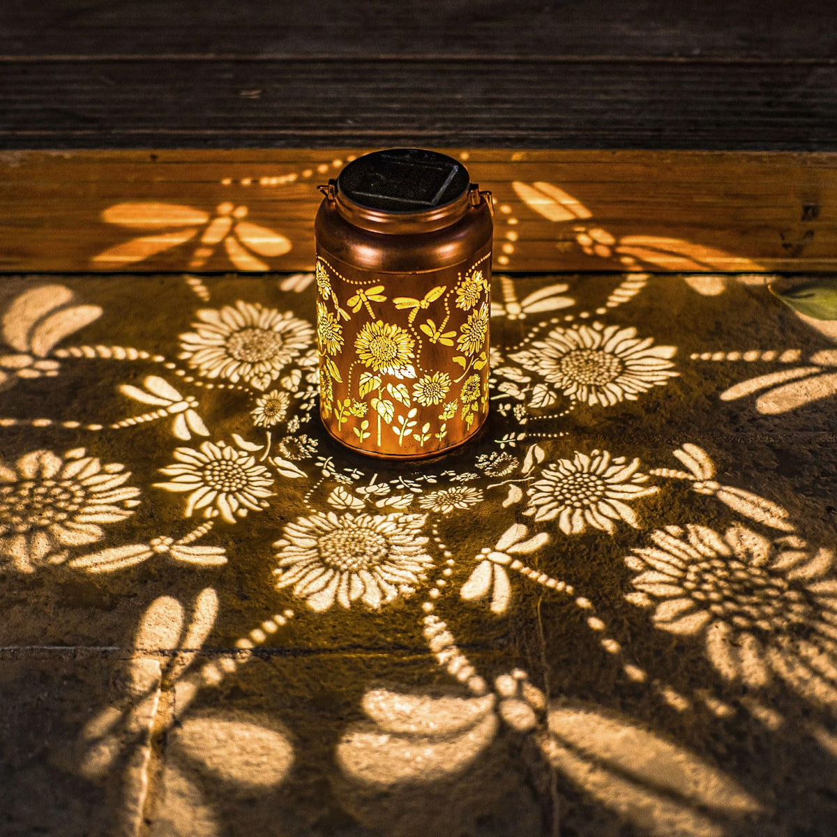 WACLSTDAY sunflower dragonfly lantern metal casts warm garden patterns.