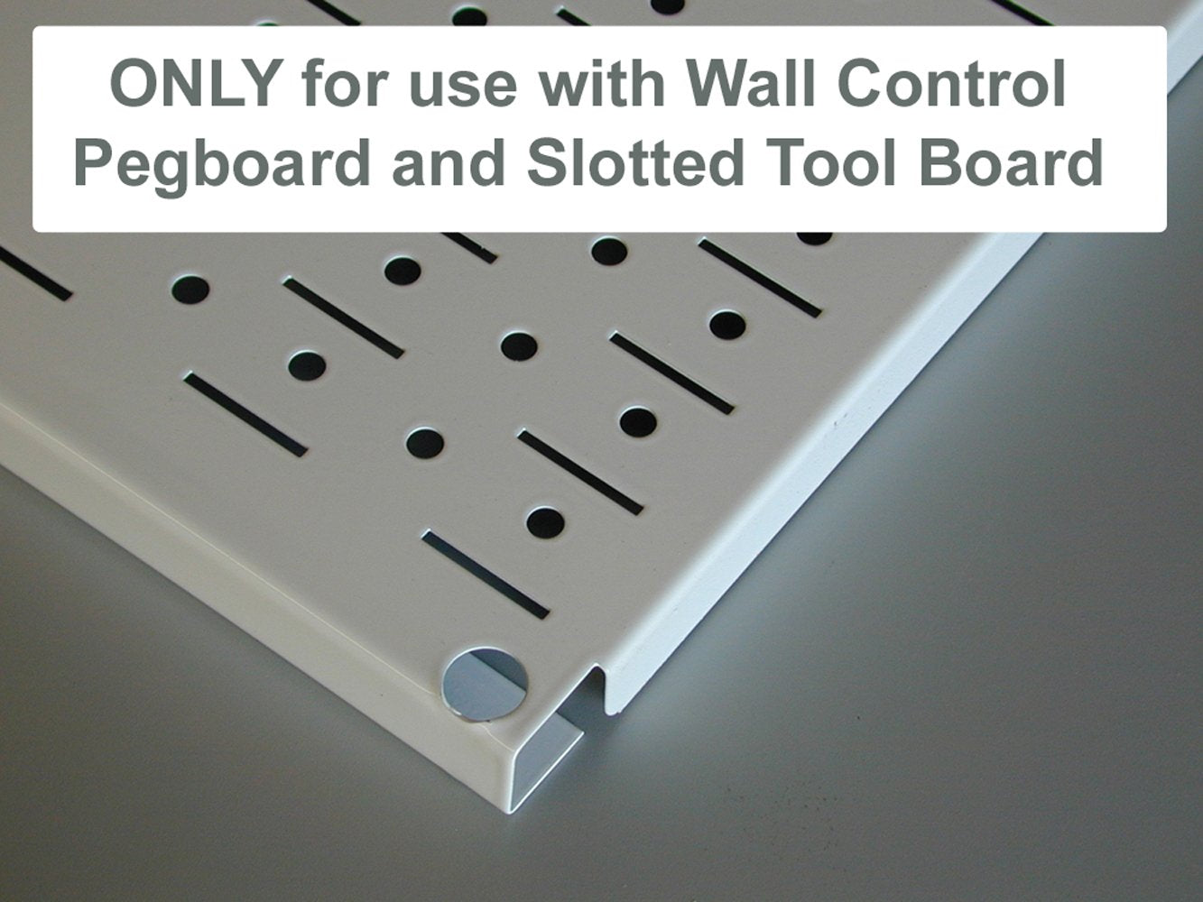 Wall Control louvered attachment demonstrates easy removal and reattachment.
